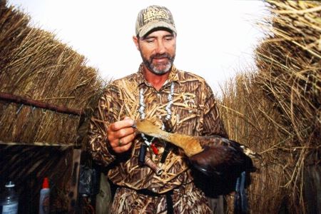Moving into the U.S., Whistling Ducks Create More Hunting Opportunities 1 Kirk Stansel with Hackberry Rod and Gun shows off a fulvous whistling duck killed in the marshes near Lake Charles, Louisiana. Both fulvous and black-bellied whistling ducks expanded their range northward and eastward in recent years. (Photo by John N. Felsher)