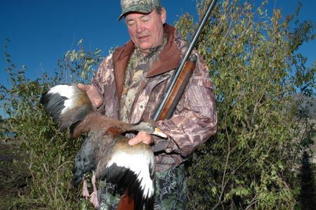 Moving into the U.S., Whistling Ducks Create More Hunting Opportunities 3 A hunter shows off a black-bellied whistling duck he bagged. As whistling ducks expand their range, they will become more common in game bags. (Photo by John N. Felsher)