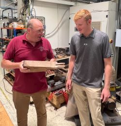 Longthorne Gunmaker’s owner James Longthorne Stewart helps Todd Hitch select a blank for a custom fitted stock on the Longthorne VIVO.