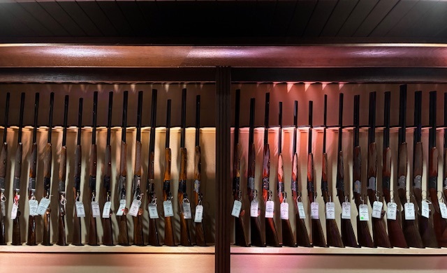 A snapshot of the racks of Faustis, Berettas, Caesar Guerinis, Brownings, Winchesters and Stevens shotguns at Mallards Shooting Supply & Apparel.