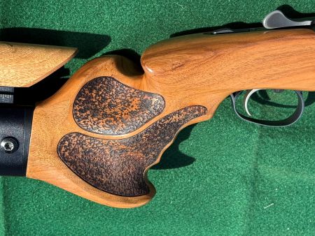 A Scientific Quest for Zero Recoil Leads a Physicist to Silicon Valley’s Grip+ 10 Laser-engraved non-slip grip surface on the finished Grip+ stock. Unlike conventional checkering, Sai Chang’s irregular grip pattern is designed to increase hand contact and control while preserving the custom contours of the stock and maintaining a clean, integrated appearance.